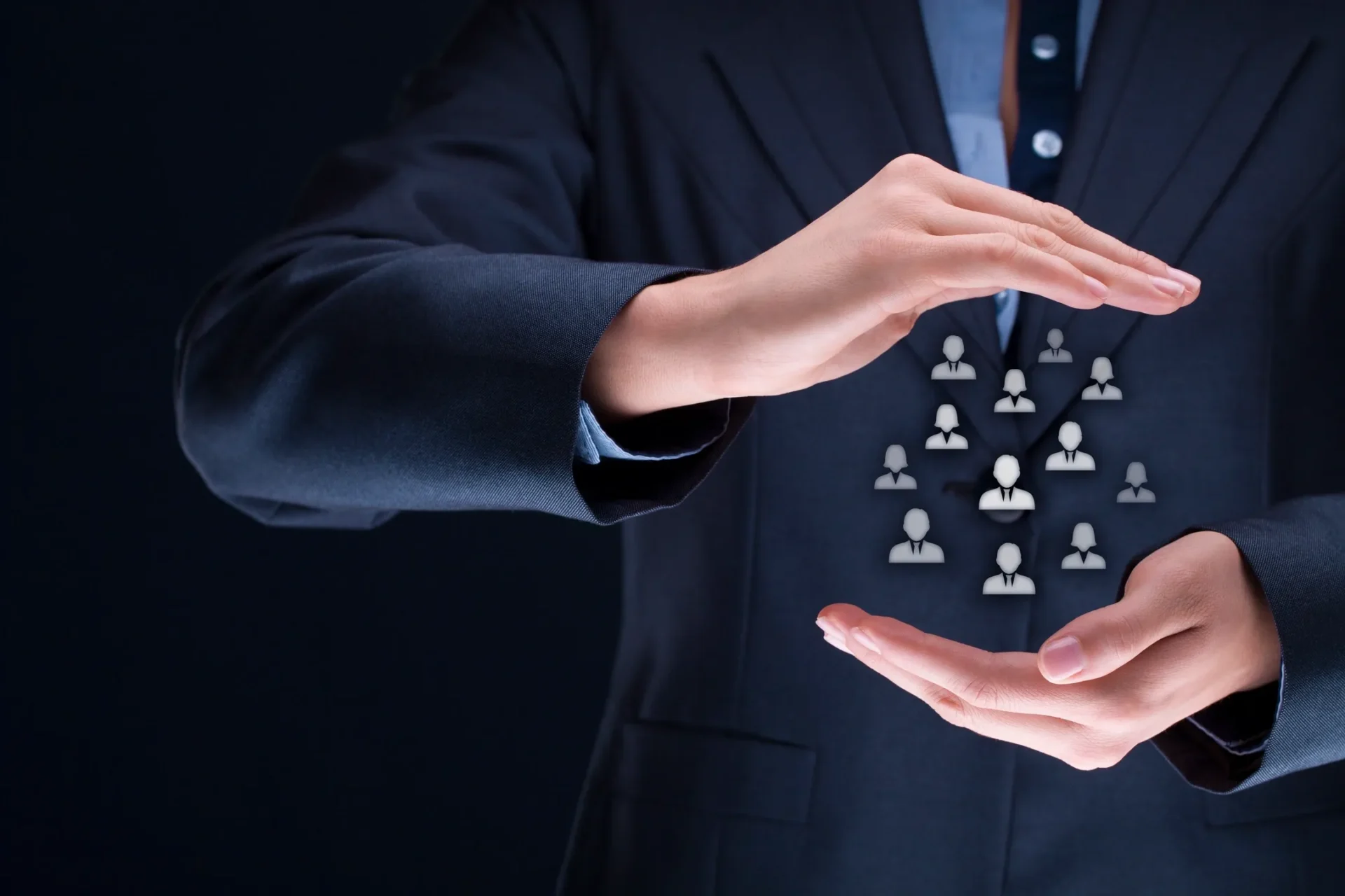 Businessperson protecting digital team icons