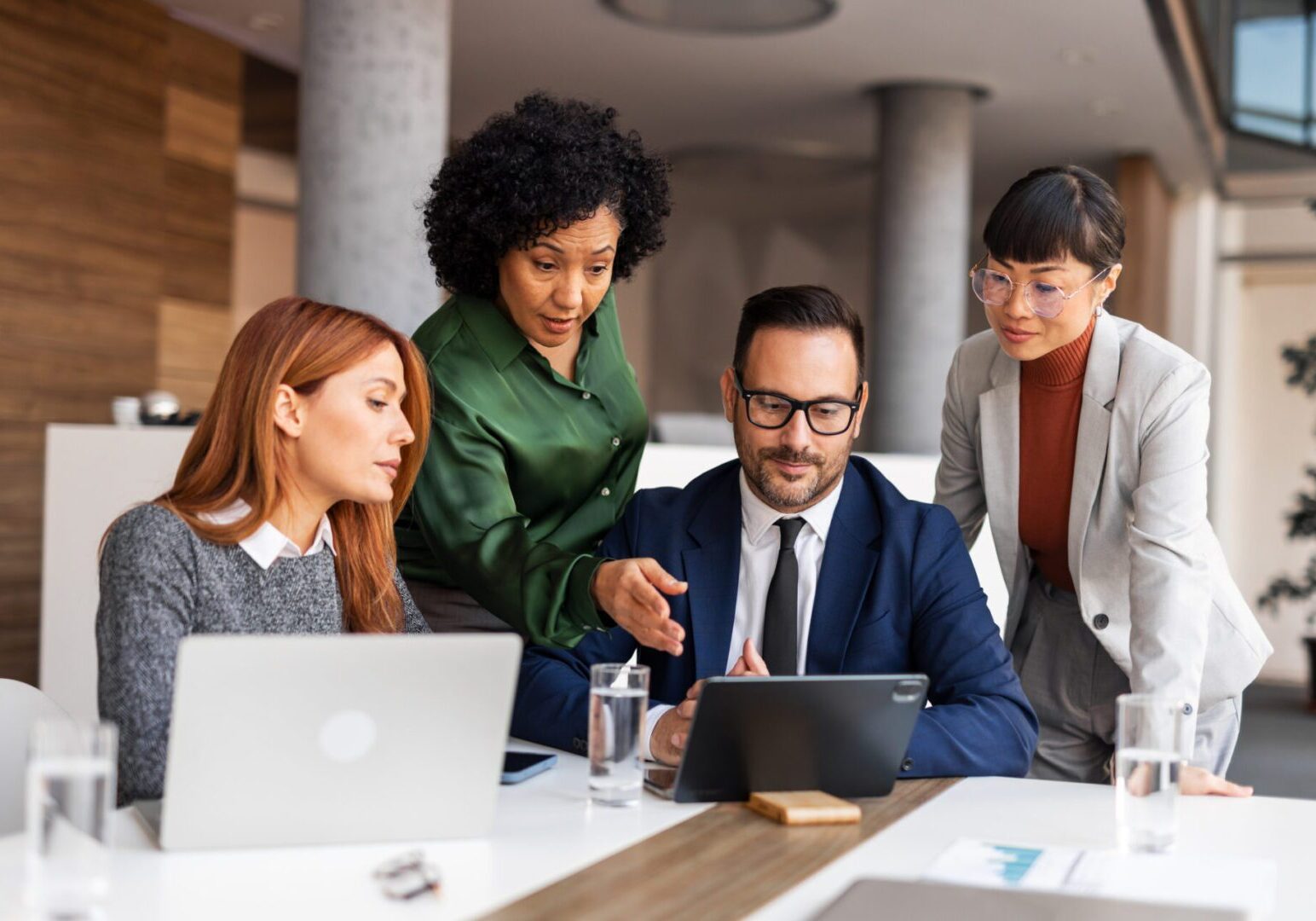 Colleagues collaborating in a modern office